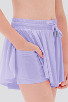 Close-up of purple butterfly shorts