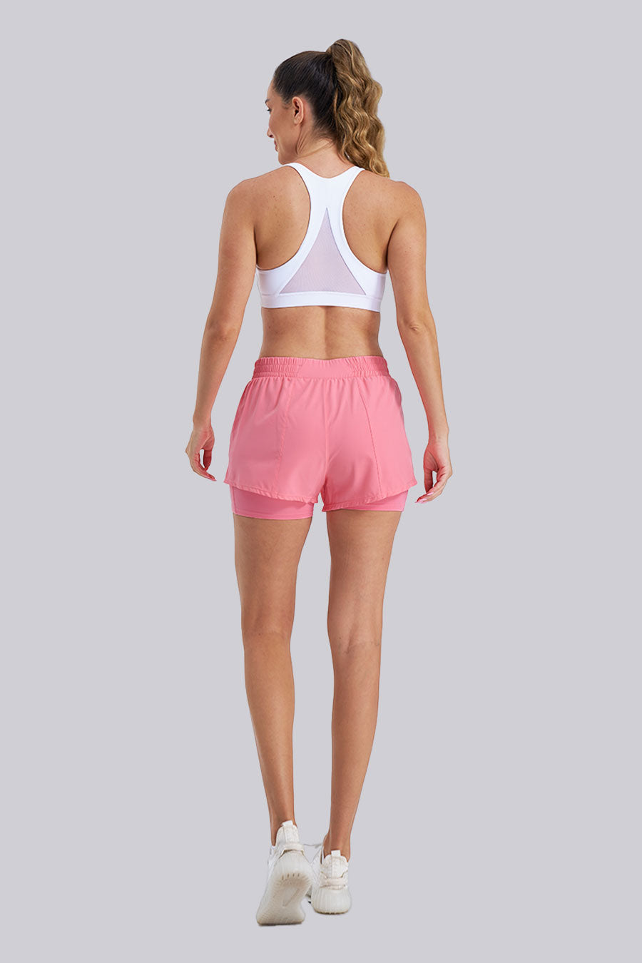 Back view of pink running shorts