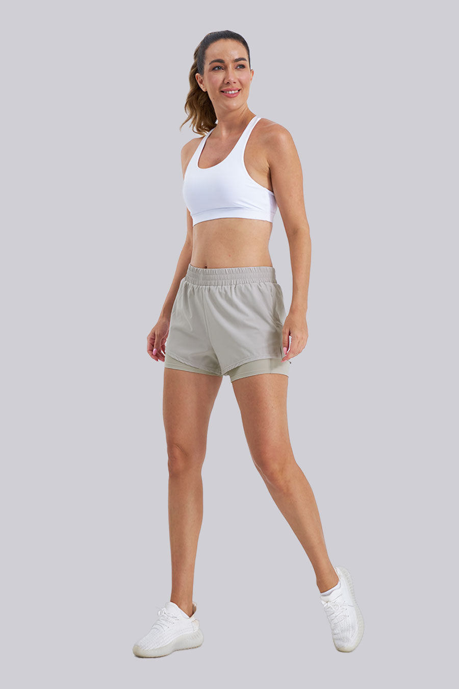 Women wearing grey running shorts