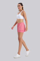 Side view of pink running shorts