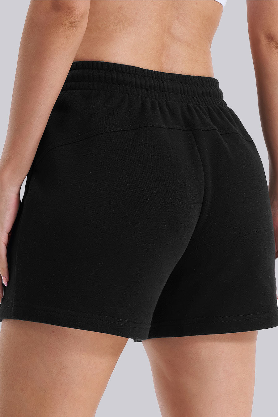 Back view black running shorts women