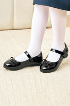 Black mary jane shoes for girls side view