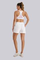 Back view white running shorts women