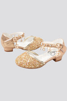 Gold sparkly mary jane shoes side view