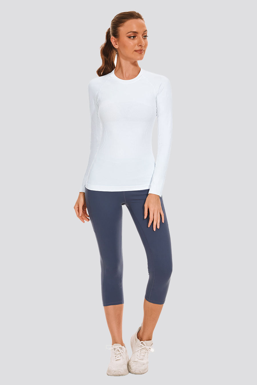 Full-body view of a cute white short sleeve top