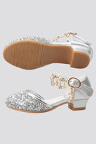 Silver sparkly mary jane shoes side view 