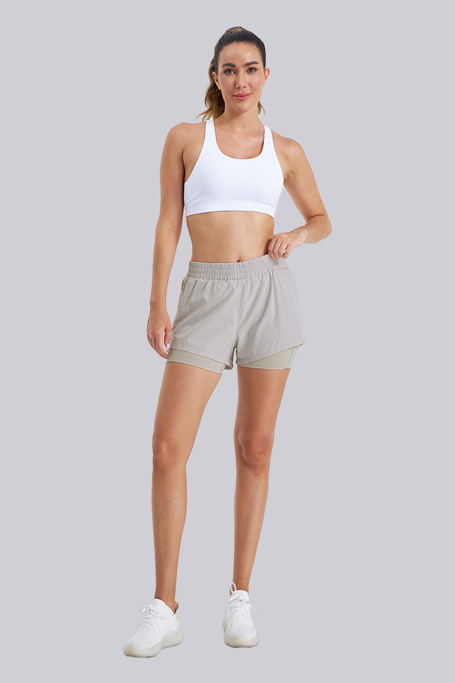 Women wearing high-waisted running shorts