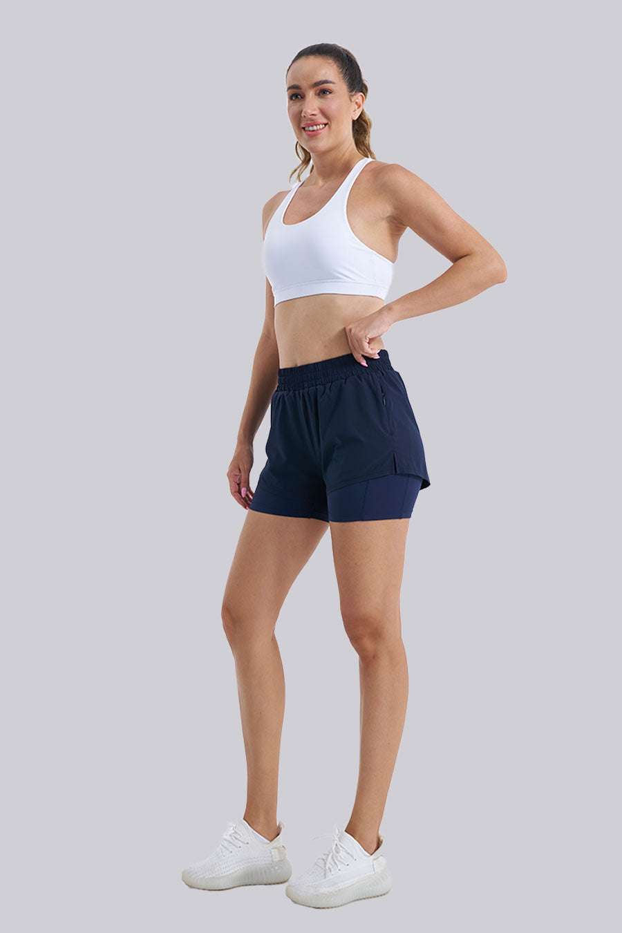 Women wearing navy running shorts