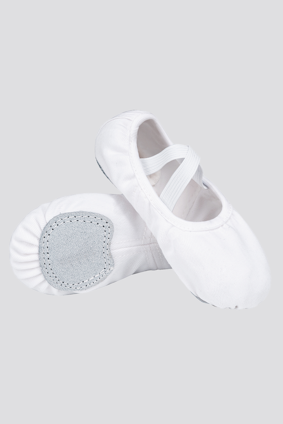 White canvas ballet shoes front view 