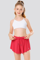 Girl wearing raspberry butterfly shorts