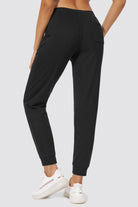 Black cotton joggers for women back view