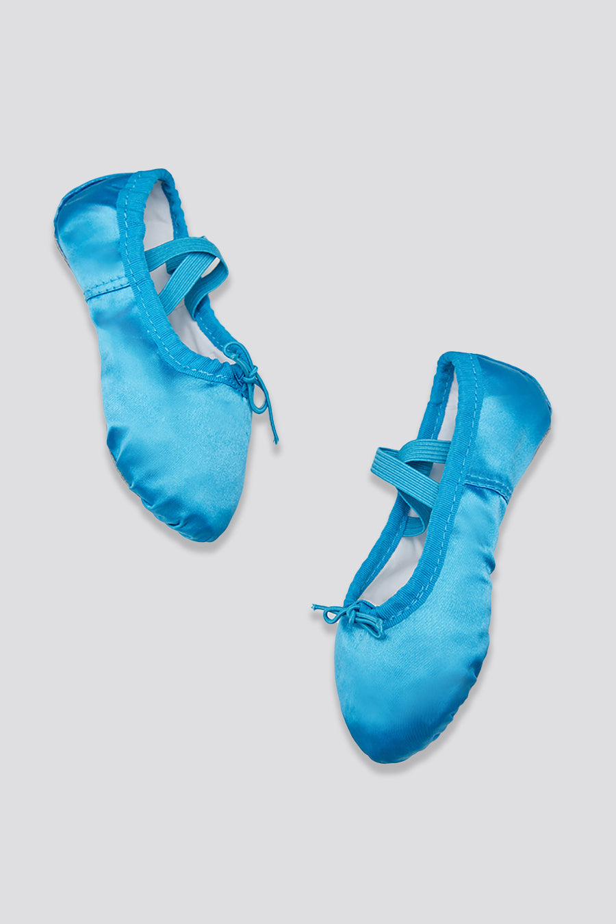 Blue kids ballet shoes side view