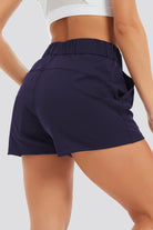 women's running shorts with phone pocket Navy side view