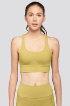 criss cross back sports bra Golden Lime front