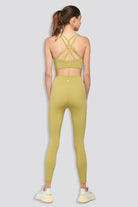 criss cross back sports bra Golden Lime front view