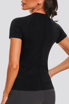 Black yoga shirts back view