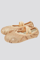 Gold glitter shoes close up