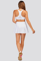 White women tennis skirt back view